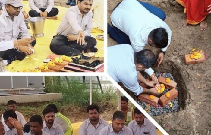 Bhoomi Poojan ceremony. A team of engineers and priests perform rituals for a new industrial manufacturing unit.